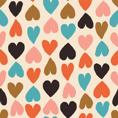Fototapeta premium Seamless romantic pattern with coloured hearts. Seamless hearted texture. Valentine's Day background