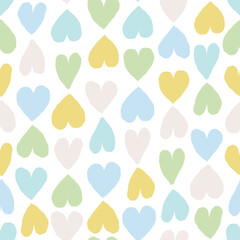 Seamless romantic pattern with coloured hearts. Seamless hearted texture. Valentine's Day background