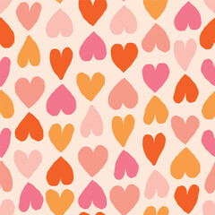 Seamless romantic pattern with coloured hearts. Seamless hearted texture. Valentine's Day background
