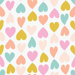 Seamless romantic pattern with coloured hearts. Seamless hearted texture. Valentine's Day background