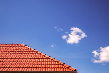 new red tiles roof and blue sky