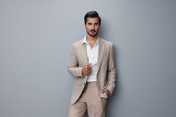 beige man businessman smiling person handsome suit happy copyspace portrait business