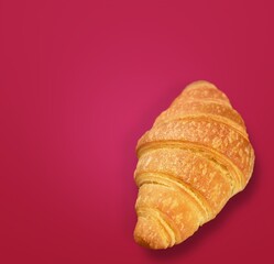 Appetizing fresh tasty croissant on desk