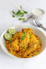 Chicken Biryani with Yogurt, Lemon and Mint Leaves Vertical Photo