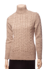 Fototapeta premium Ladies cable knit sweater on female mannequin isolated on white