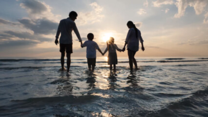 Image out of focus. Family playing water sea together on the beach. Summer Vacation, Travel and Relaxation