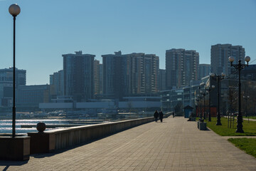 Fototapeta na wymiar New comfortable embankment on Black Sea coast in Novorossiysk. Novorossiysk, Russia - December 20, 2022