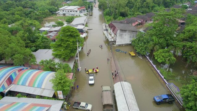 High-angle view of the Great Flood, Meng District, Thailand, on October 3, 2023, is a photograph from real flooding. With a slight color adjustment