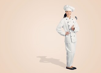 Happy young chef baker posing