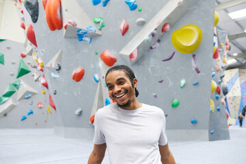 Portrait Of Smiling Young Man Excited To Try Bouldering At Indoor Centre © Southworks
