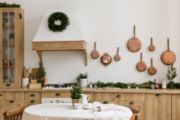 Light wooden kitchen with Christmas decoration