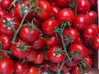 Delicious looking deep red tomatoes at the farmers market