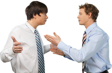 Young male businessman yelling at an employee