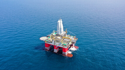 day. aerial survey, there is a semi-submersible drilling platform in the sea with the name 