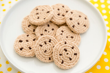 Handmade crochet cookies with chocolate chips. Delicious dinner, sweet snack. Kitchen toys for young children. Sensory cooking games at home. Develop of kids imagination. Roles of professions.
