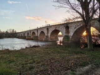 Naklejka premium old bridge over the river