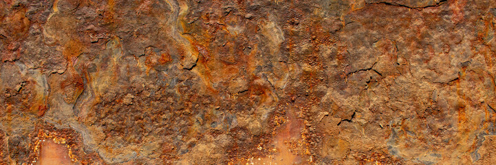 Rust of metals.Corrosive Rust on old iron with a hole. Rusted orange painted metal wall.