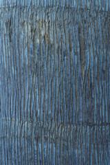 Close-up. Textured natural indigo coating, with vertical pattern of uneven stripes. Modern...