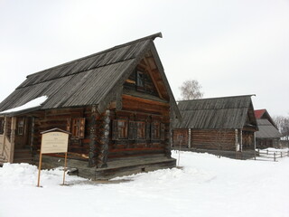 old wooden house in winter