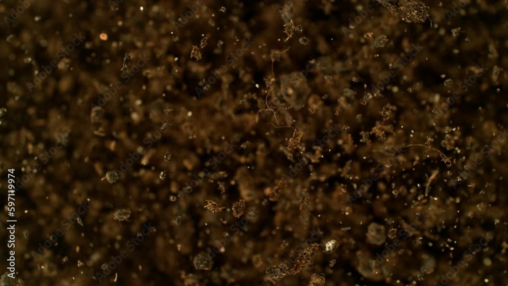 Poster Super slow motion of exploding and rotating earth in the air. Filmed on high speed cinema camera , 1000fps. Speed ramp effect.