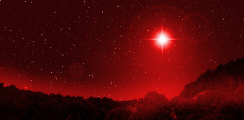Bright red star of Bethlehem indicates the Nativity of Jesus Christ.