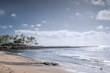 Sunny beach in Costa Teguise, Lanzarote, Canary Islands