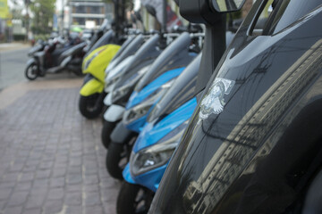 Fototapeta premium A row of motorcycles waiting for buyers.