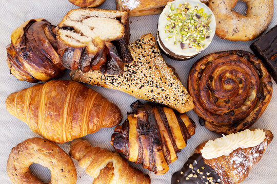 sweet pastry assortment top view.french pastries.Many mixed breads.Delicious looking french croisant, top view
