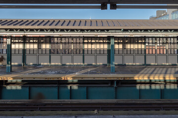 Empty outdoor metro station on cold clear day