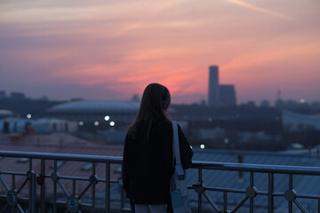 Fototapeta premium silhouette of a person on the bridge