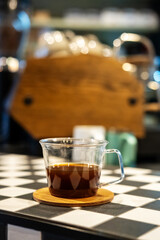 Caffeinated beverage served on the cafe table