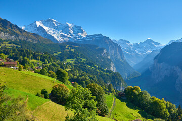 Fototapeta na wymiar Mountain view of the high peaks near Wengen village in Switzerland.