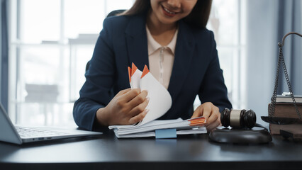 Portrait of female asian lawyer manager in formal suit working with signed insurance contract law, legal, legislation, online consulting real estate clients close deal in realtor office.