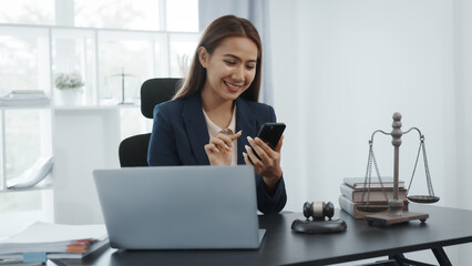 Portrait of female asian lawyer manager in formal suit working with signed insurance contract law, legal, legislation, online consulting real estate clients close deal in realtor office.