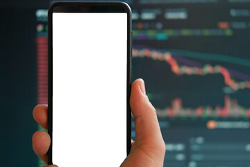 Black phone with blank mockup screen on rising stock graph. Closeup hand showing smartphone isolated white display. Online banking, Fund App use. Financial analyst on Invest Market, Bank collapse 2023