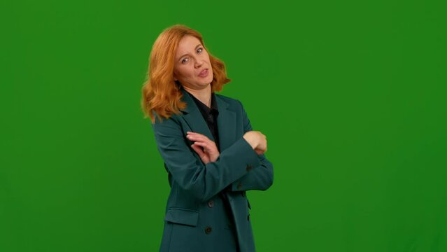 Woman pointing herself and say who me, displeased at indicent proposal over green screen background. Making no gesture, expressing disgust and dissatisfaction rejecting man.