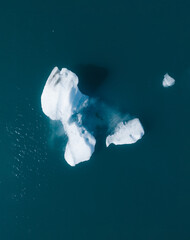 Icebergs drone aerial image top view - Climate Change and Global Warming. Icebergs from melting...