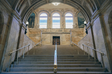 Breathtaking architecture details of panoramic dome mural columns scenic building interior view with historic walls, chandeliers, marble statues and staircases in public city landmark