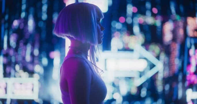Creative Young Female Standing in a Sci-Fi Cyberpunk City with Neon Lights, Dystopian Colorful Urban Environment. Cosplay Model with Blue Hair Excited About Technological Surroundings
