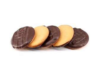 Digestive cookies half covered with dark chocolate on white background