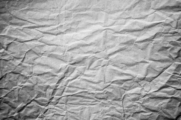 Macro dark grey crumpled paper texture surface
