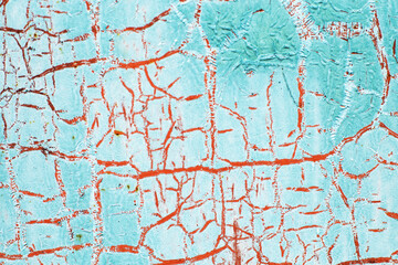 Rusty metal abstract background. Texture of an old blue grunge metal plate with cracked paint.