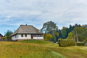 landscape with traditional houses in autumn in the mountains 9