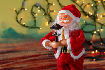 Santa Claus and Christmas puppets on abstract background with copy space