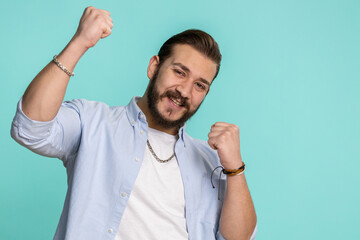 Happy joyful lebanese man shouting, celebrating success, winning, birthday, lottery jackpot goal...
