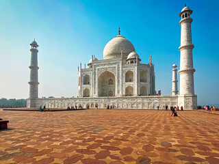 Agra, Uttar Pradesh, India - 12.15.2022: Taj Mahal, Agra, India. Tourists visiting a popular tourist attraction.