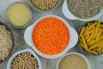 Orange lentil in bowl. Protein pulse that is dried and then soaked and cooked before eating. Vegan organic product. Top view.