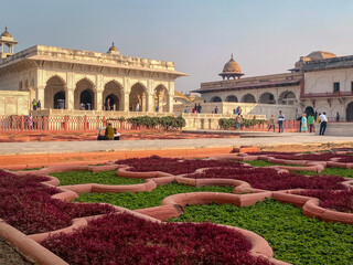 The famous red fort in the city of Agra, India. Tourists visit a popular tourist attraction.