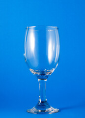 Wine glasses. Empty on a blue background.