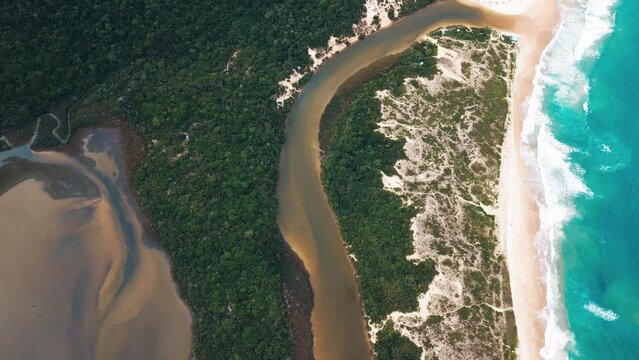 Aerial view of the sandy beach in Brazil. Lagoinha do leste beach and lagoon on the south of Brazil